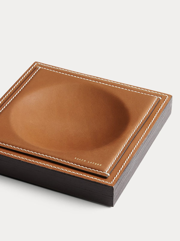 A handy catchall to keep their workspace tidy