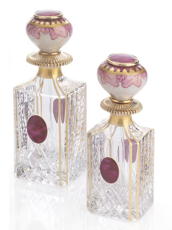 Feminine mauve-toned perfume bottles with real gold