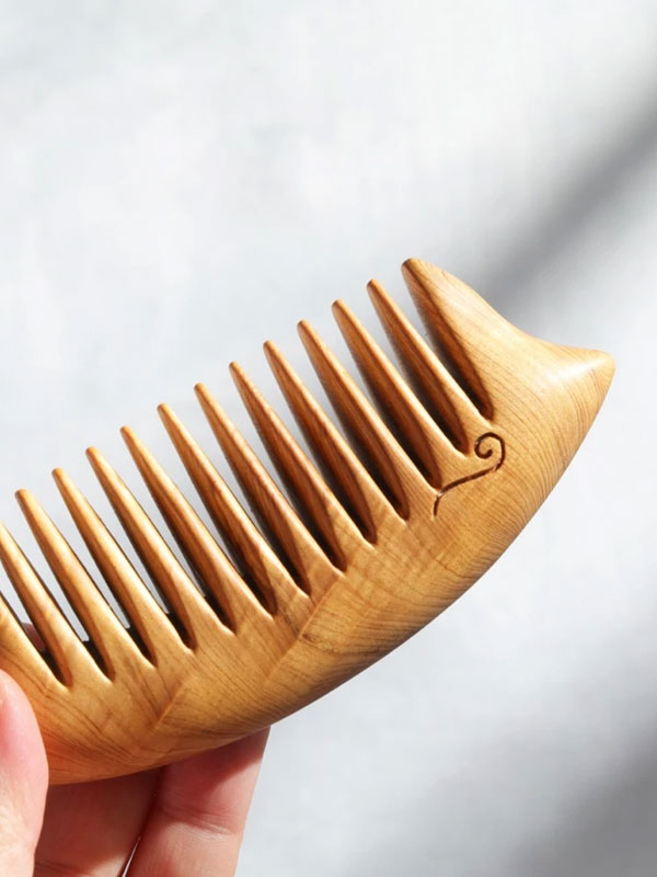 A special wooden comb for healing massage