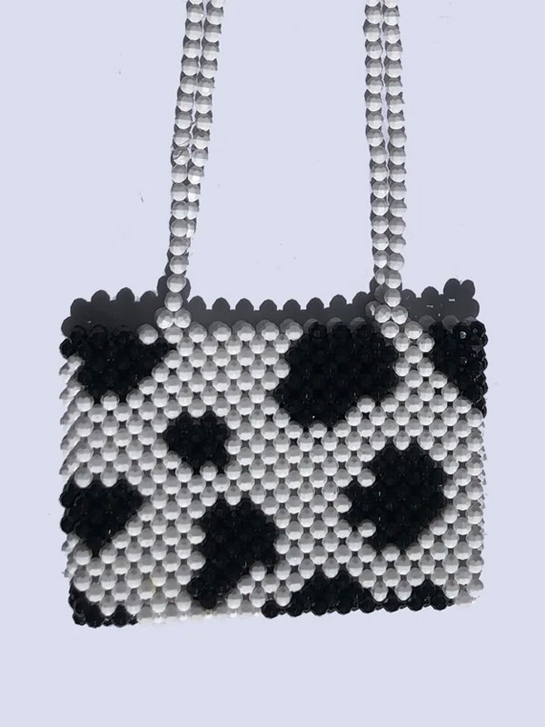 Hand-knit beaded cow print bag