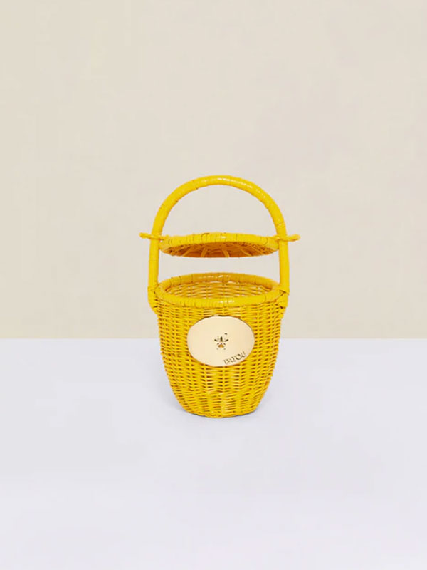 Elegant wicker bucket bag with gold accent